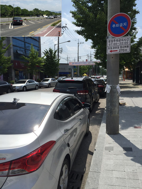 대구 성서모다아울렛 인근 도로에 불법 주정차한 차들이 줄어들지 않고 있다. 달서구청이 공영주차장을 마련하는 등 대책을 세웠지만 공영주차장은 한산한 반면 이면도로에는 불법 주정차가 넘쳐나고 있다. 노경석 기자