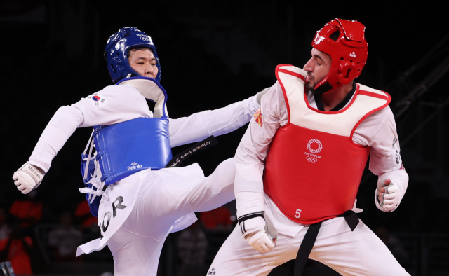 27일 일본 마쿠하리 메세홀에서 열린 도쿄올림픽 남자 태권도 80㎏ 초과급 4강 한국 인교돈-북마케도니아 데얀 게오르기예프스키. 인교돈 패. 연합뉴스