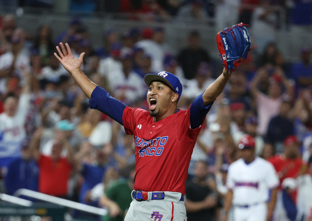 3연속 탈삼진으로 푸에르토리코의 WBC 8강 이끈 디아스의 다치기 직전 포효하는 모습. AFP=연합뉴스