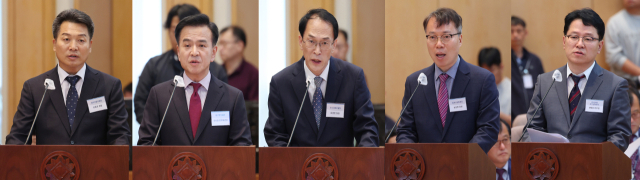 16일 한국은행 대구경북본부에서 열린 국회 기획재정위원회의 한국은행 대구경북본부, 한국은행 포항본부, 대구지방국세청, 대구본부세관, 대구조달청, 동북지방통계청에 대한 국정감사에서 (왼쪽부터) 윤종건 대구지방국세청장, 대구지방국세청장, 주시경 대구본부세관장, 이영호 대구지방조달청장, 송성헌 동북지방통계청장, 권태용 한국은행 대구경북본부장이 업무현황보고를 하고 있다. 김영진 기자 kyjmaeil@imaeil.com