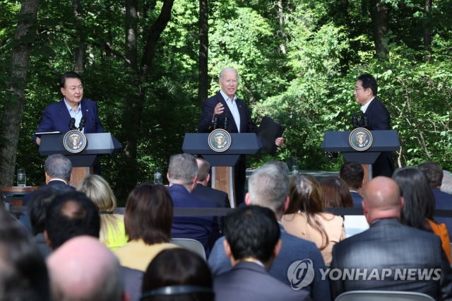 지난해 8월 조 바이든 대통령과 윤석열 대통령, 기시다 후미오 총리의 캠프 데이비드 한미일 정상 공동기자회견 모습. 연합뉴스