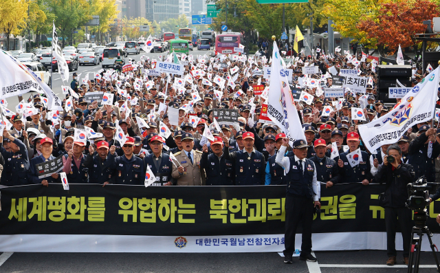 지난달 28일 오후 서울 광화문역 인근에서 대한민국월남참전자회 회원들이 북한 러시아파병 규탄집회를 하고 있다. 연합뉴스