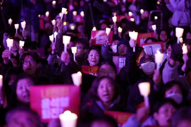 4일 오후 서울 동화면세점 앞에서 전국민주노동조합총연맹 주최로 열린 