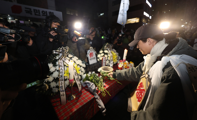 11일 오후 대구 수성구 국민의힘 대구시당 앞에서 열린 대구촛불행동 주최 